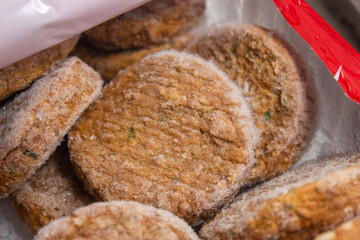 Frozen meatballs. Top view of frozen meat product.