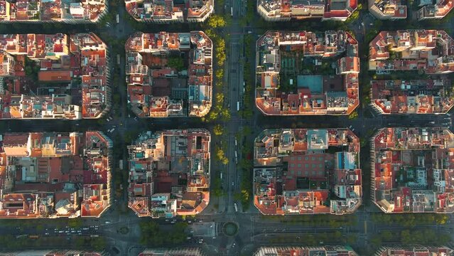 Aerial view of Barcelona city skyline, Passeig de Gracia and Eixample residential district at sunrise. Catalonia, Spain