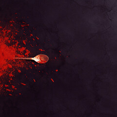 Blood splash on a black background with text space.