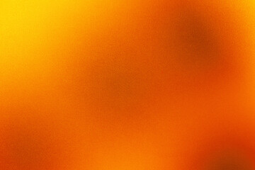 Yellow burnt orange red fiery golden brown black abstract background for design. Color gradient, ombre. Rough, grain, noise. Colorful bright spots.