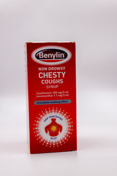 Benylin cough syrup liquid medicine for chesty coughs. Box isolated against white background. Bottle of non drowsy formula. 