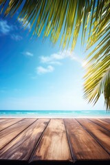 Empty wooden table in front of blurred background of the beach, coconut palm, blue sky among bright sunlight with copy space