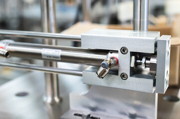 Industry concept using artificial intelligence in a smart factory. Construction of a Smart Factory pneumatic assembly line equipped with sensors and pneumatic equipment.