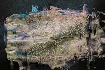 white shiny acrylic color on blue glitter background, cool photo overlay.