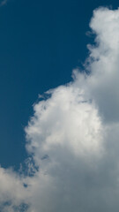 Blue sky with white clouds. Blue sky with white clouds close-up. White clouds on a sunny day