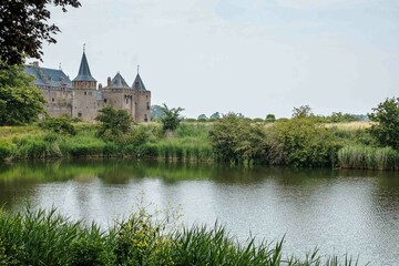 Obraz premium Castle near Amsterdam called Muiderslot. A 15th century building and a landmark