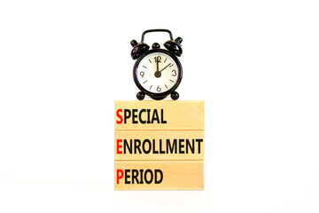 SEP symbol. Concept words SEP Special enrollment period on beautiful wooden block. Black alarm...