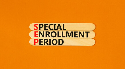 SEP symbol. Concept words SEP Special enrollment period on beautiful wooden sticks. Beautiful orange table orange background. Medical and SEP Special enrollment period concept. Copy space.