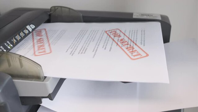 confidential documents being copied 