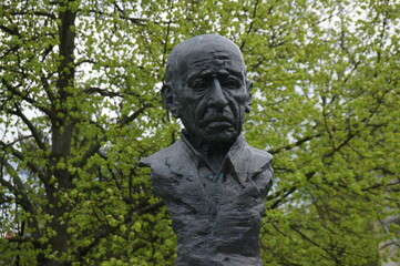 Fototapeta na wymiar Bust of Igor Stravinsky (famous composer and pianist) in Alley of Fame (or Celebrity Alley), sculptor Piotr Suliga. Kielce, Poland.