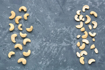 Frame made of tasty cashew nuts on blue background