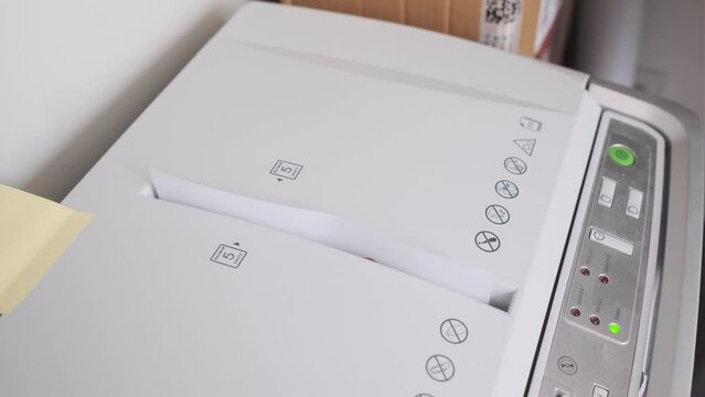 a Paper shredder is Shredding confidential or Classified documents with generated placeholder text