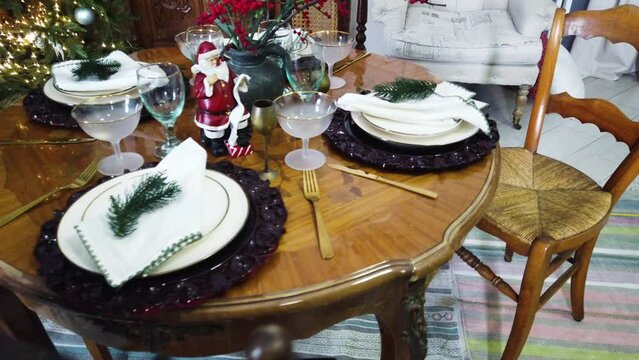 Chritmas dinner, vintage table decotated with christmas details, festive house interior
