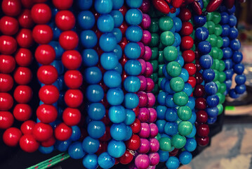 Wooden red beads on the market