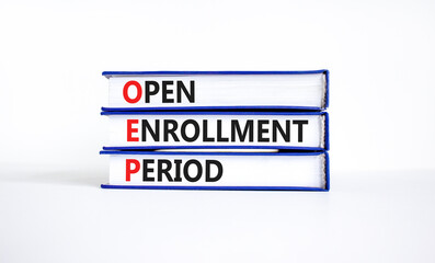 OEP symbol. Concept words OEP Open enrollment period on beautiful books. Beautiful white table white background. Medical and OEP Open enrollment period concept. Copy space.