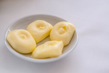Butter in dish on table