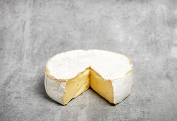 wine opener accessories tools,rose bottle and brie camembert cheese isolated gray tiles background.glass with wine,pourer, stopper, corkscrew and cork,aerator,vacuum pump.space for text.pouring red