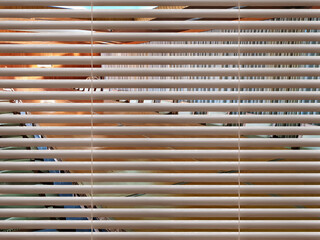 View through white office blinds on classic style meeting room