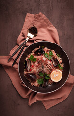 Seafood paella, shrimp and mussels risotto, rice, homemade, top view, no people,