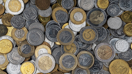 A pile of gold and silver coins.