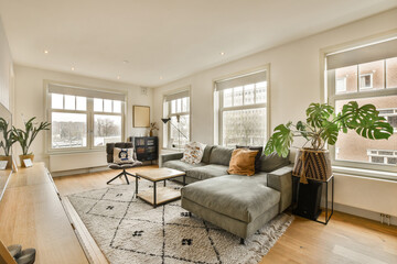 a living room with hardwood flooring and large windows looking out onto the cityscapeatrooms com