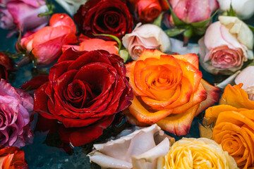 Floating flowers in water fountain.