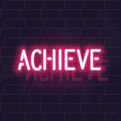Neon achieve lettering. Motivation text on dark wall background.