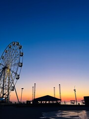 Ferris wheel at the sunset time