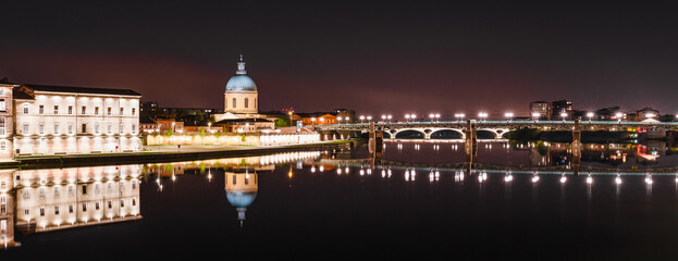Naklejka na ściany i meble French city Toulouse and Garonne river night view. France, Europe