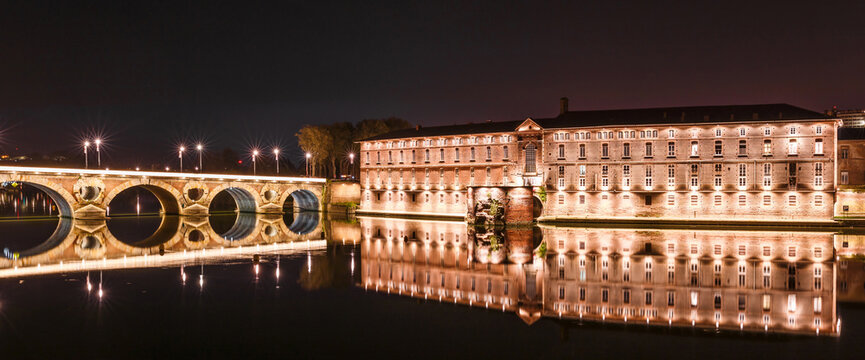 French city Toulouse and Garonne river night view. France, Europe