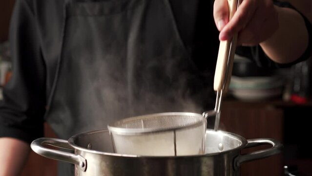 The cooking process of characteristic Chinese chicken noodle soup