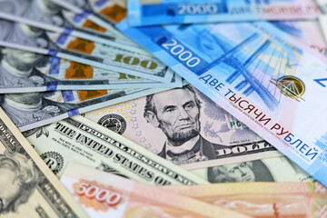 US dollars and russian rubles. Concept of exchange rate, american sanctions against Russia