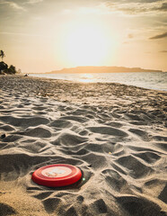 Golden Yellow and Orange Sunset on the beach, the sun hides behind Cerro el Morro, photo against light, Canales Beach, Lecheria.