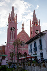 Naklejka premium pink church in a town in latin america