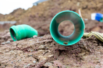 on the construction site - the basic work before the house is erected includes the earthwork with laying the supply and disposal lines such as sewage pipes and power supply
