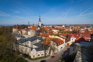 Obraz premium Late afternoon sunset view overlooking the medieval walled city of Tallinn Estonia on an early autumn spring day in the Baltics region of Northern Europe.