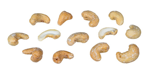 Set of whole or halved salty cashew nuts isolated on a white background. Anacardium occidentale. Closeup a group of delicious roasted cashews with salt crystals. Healthy organic seeds of kidney shape.