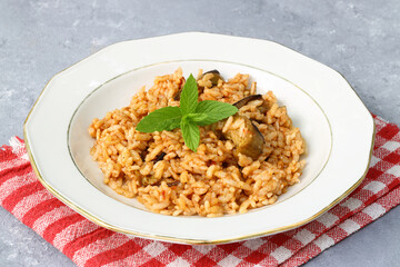 Turkish Stuffed Rice with Currants for Preparing Dolma in Plate with Spoon / Pilav or Pilaf. Traditional Food. Ready to Eat.