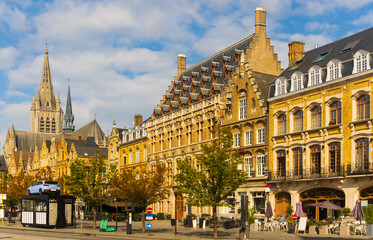 Fototapeta na wymiar Summer landscape of city streets in Ieper with a view of residential buildings, Belgium