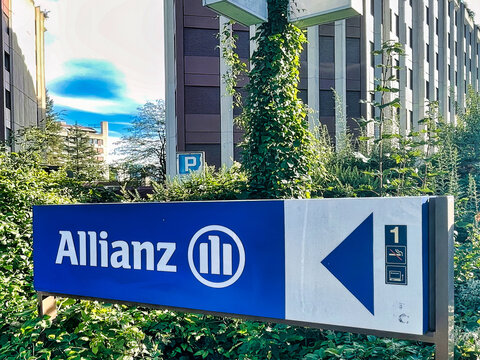 geneva, switzerland - 08 September 2022: the sign with logo on it in front of the office building of allianz insurance