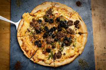 pizza on a wooden table