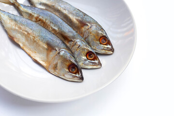 Salted fish on white background.