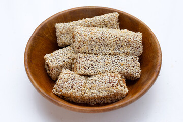 White sesame rolls with peanut. Sweetened dessert