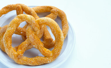 Soft pretzels on a white background.