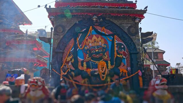 Early morning at the Kaal Bhairav statue surrounded by Temples in Kathmandu Durbar Square, Nepal
