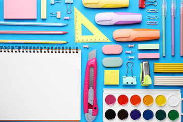 Different school stationery on light blue background, flat lay. Back to school
