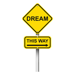 Yellow road signpost with words Dream, This way and arrow on white background