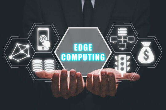 Edge computing modern IT technology concept, Businessman hand holding edge computing icon on virtual screen, Business, technology, internet and networking
