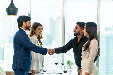 Group of Business people teamwork partnership handshake during success with corporate financial business agreement at office meeting room. Executive manager successful signing business contract deal.