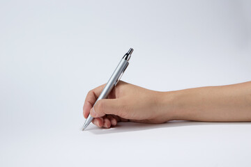 Hand holding a pen isolated on white background